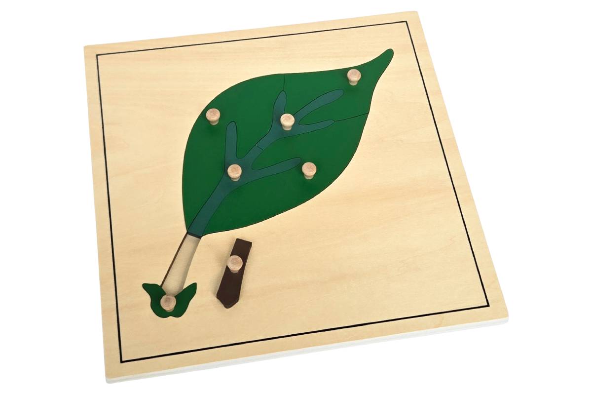 Leaf puzzle with wooden knobs.