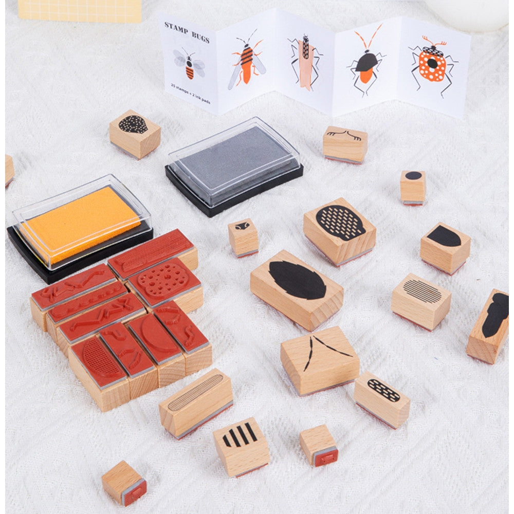 Wooden insect stamp kit with its parts laid out.