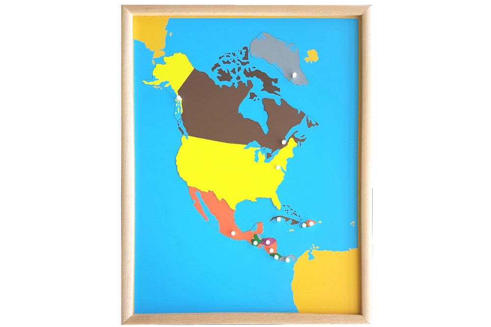 Puzzle map with pieces representing the countries of North America in different colours. Each country's knob is positioned at its capital. The puzzle has a wooden frame.