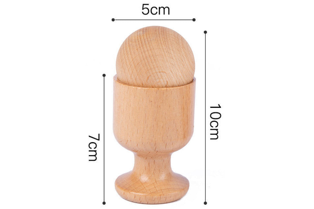 Ball measures 5 cm. Cup measures 7 cm. Ball inside cup together measure 10 cm.