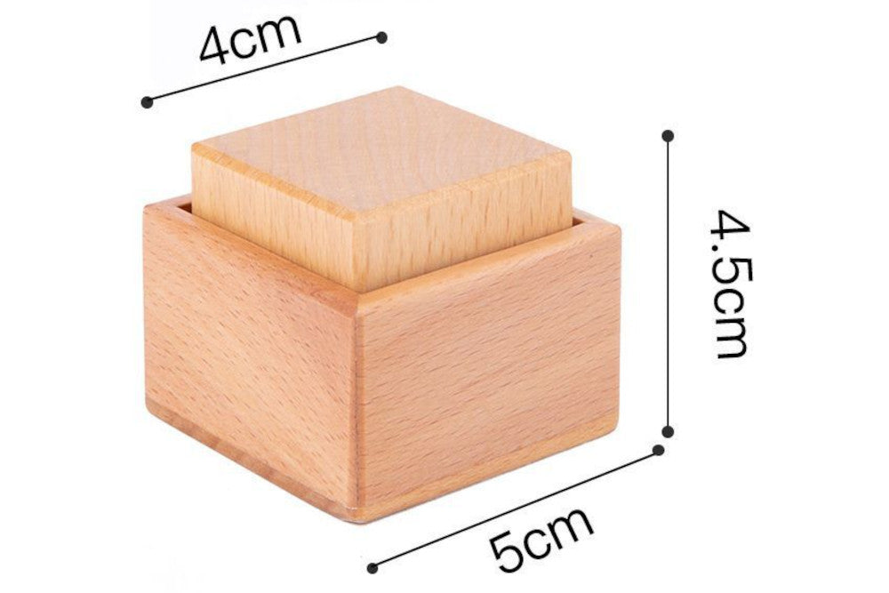 Cube measures 4 cm. Box measures 5 cm. Height of cube inside box together is 4.5 cm.