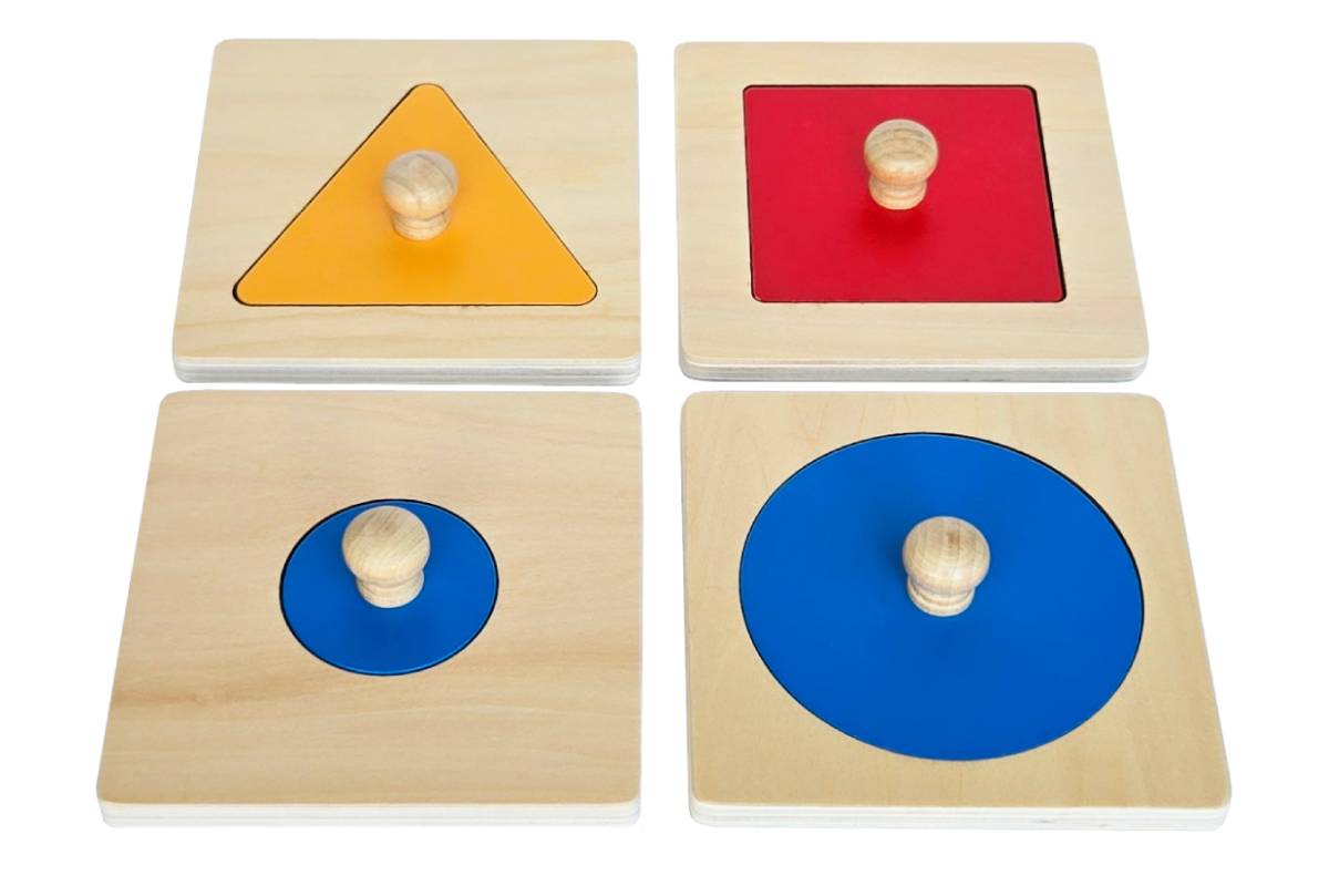 Set of four shape puzzles: small blue circle, large blue circle, yellow triangle, and red square.