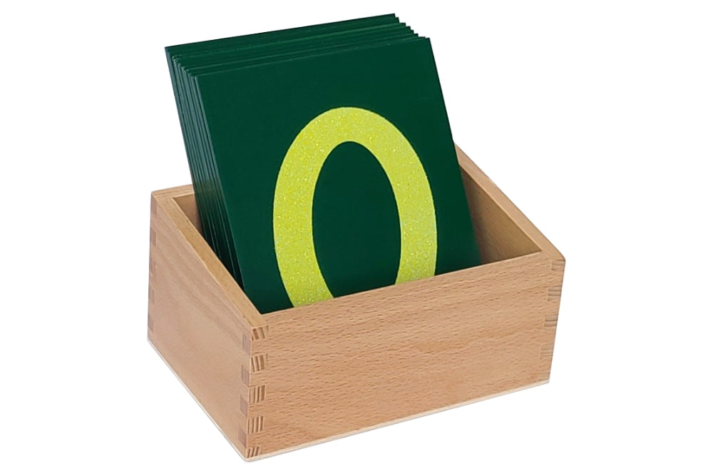 Green sandpaper numbers 0-9 in a wooden box.