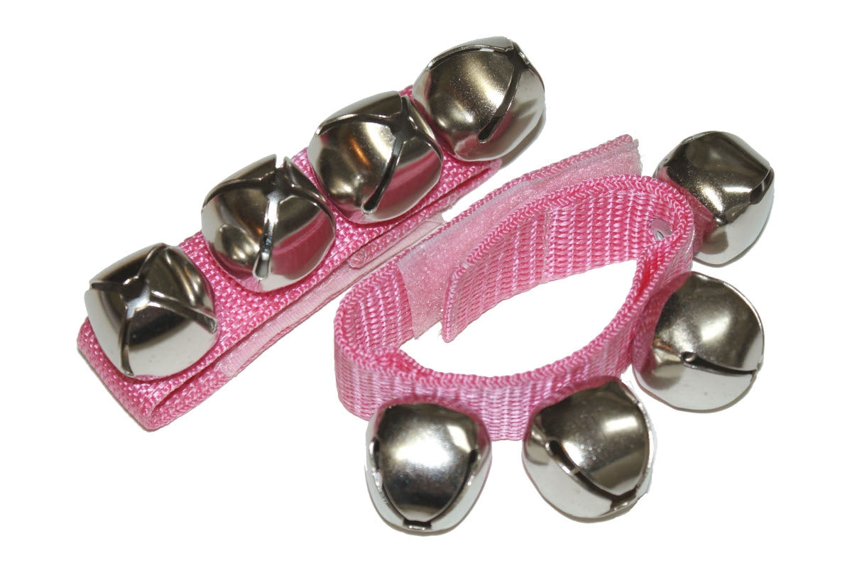 A pair of pink bell straps for the wrists. Each strap has four bells.