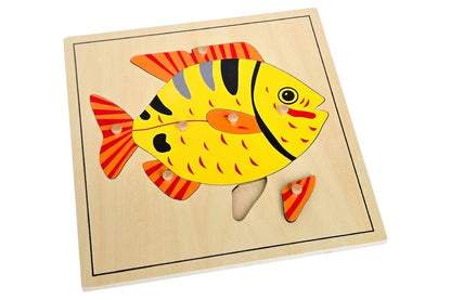 Fish puzzle with wooden knobs.