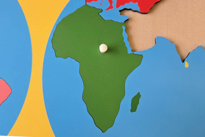 Green piece representing Africa.