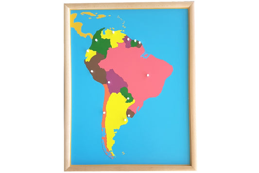 Puzzle map with pieces representing the countries of South America in different colours. Each country's knob is positioned at its capital. The puzzle has a wooden frame.