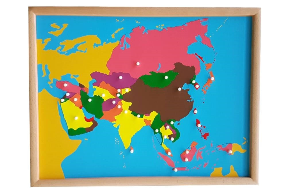 Puzzle map with pieces representing the countries of Asia in different colours. Each country's knob is positioned at its capital. The puzzle has a wooden frame.