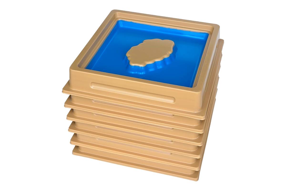 6 land and water form trays stacked together.