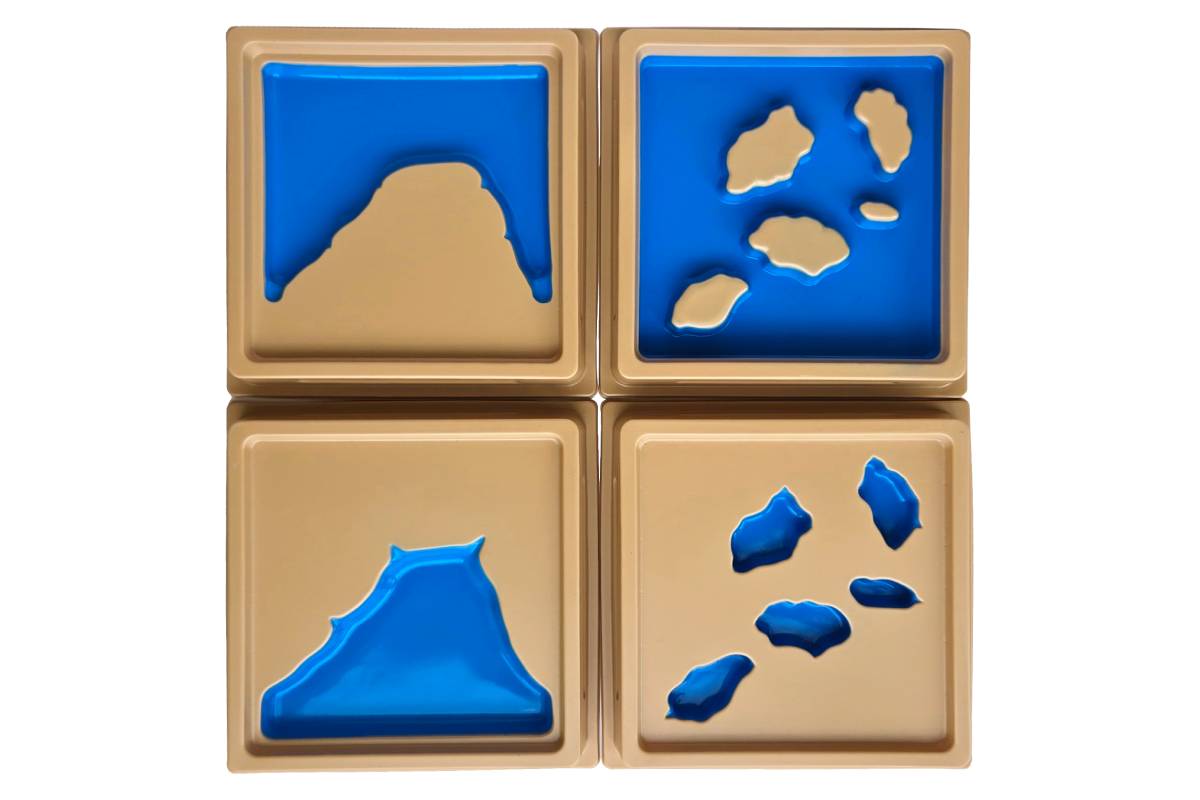 4 land and water form trays: bay, cape, archipelago, and system of lakes.