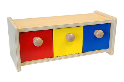 Wooden box with three bins in red, yellow, and blue. All three bins are closed.