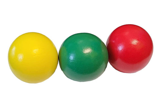 Three wooden balls in yellow, green, and red.