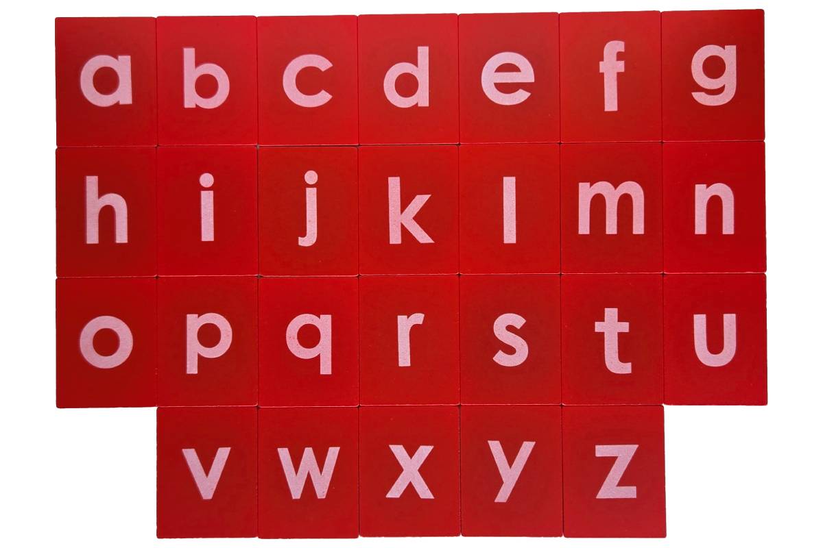 Red sandpaper letters in print lowercase a-z.