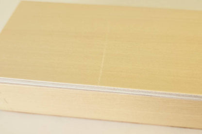 Close-up of scratched lid.