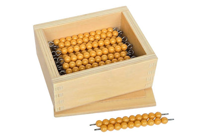 45 golden bead bars of ten in a wooden box.