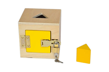 Yellow lock box with triangular prism.