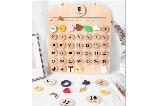 Wooden monthly calendar with adjustable month, day of the week, and day. The calendar is set to August with the 1st falling on a Sunday, with 31 days in the month.