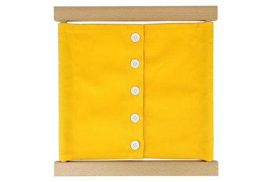 Wooden small-buttons dressing frame with yellow fabric and white buttons.