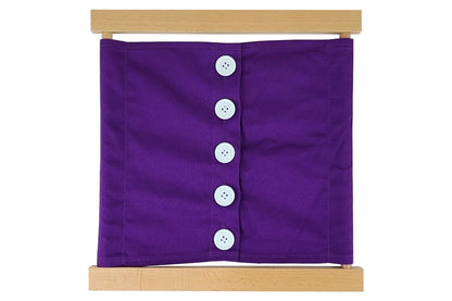 Wooden large-buttons dressing frame with purple fabric and white buttons.