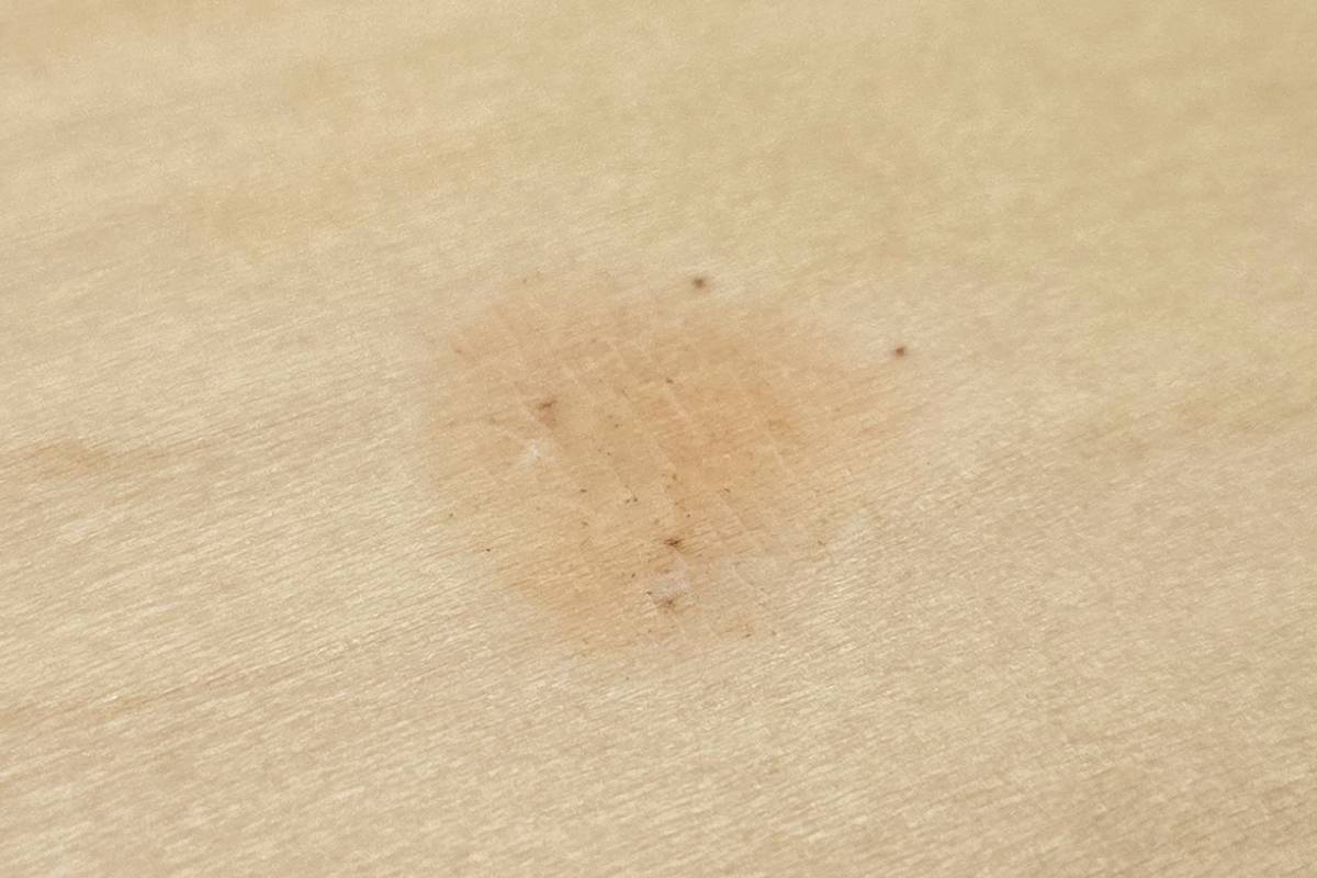 Close-up showing discoloured spot in the finish