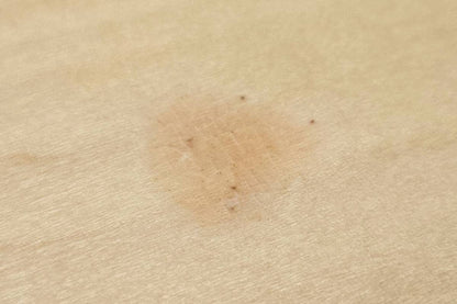 Close-up showing discoloured spot in the finish